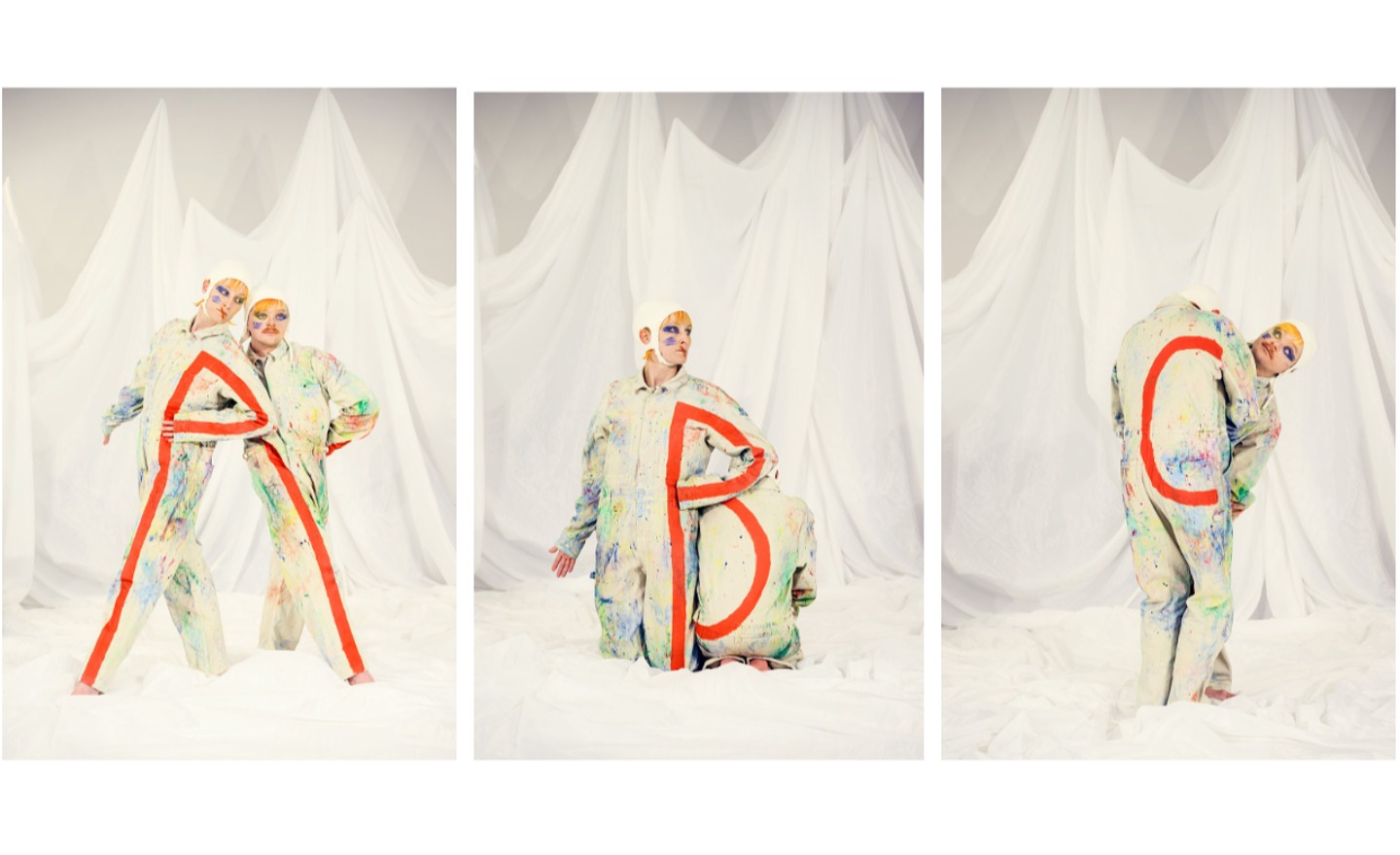 2 artister bildar bokstäverna ABC