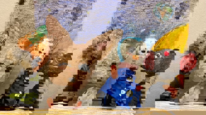 Fyra handdockor som föreställer olika djur.