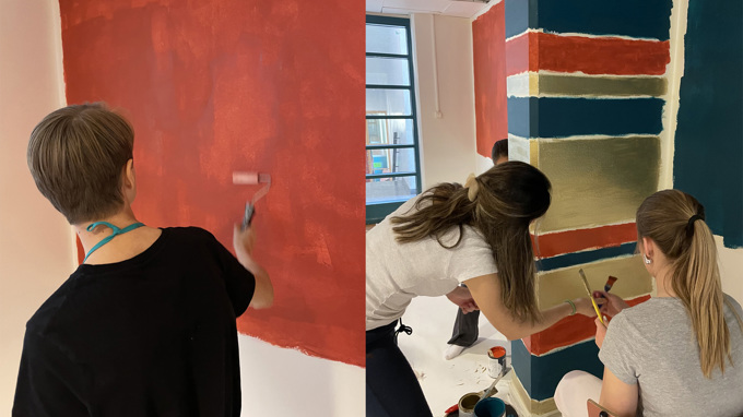 Elever målar väggar.